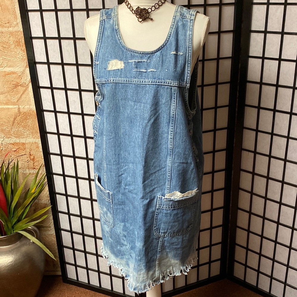 Denim shift dress size large. Slip over the head buttons under each arm.